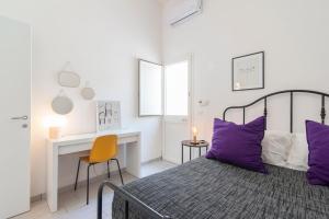 Łóżko lub łóżka w pokoju w obiekcie Casa Clara - Lecce Selection