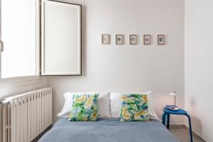 Łóżko lub łóżka w pokoju w obiekcie Casa Clara - Lecce Selection