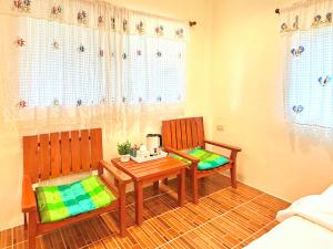 Postel nebo postele na pokoji v ubytování The Golden View Resort สวนผึ้ง