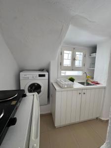 Køkken eller tekøkken på To spitaki + 2 billeder