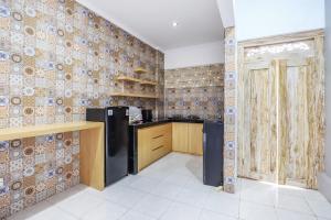 Η κουζίνα ή μικρή κουζίνα στο Ava Guesthouse #4 - Budget and Simple Room +16 φωτογραφίες