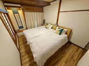Postel nebo postele na pokoji v ubytování TOKYO HOSHI VILLIA-Private Villa in Tokyo ideal for groups and families