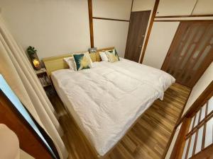 Postel nebo postele na pokoji v ubytování TOKYO HOSHI VILLIA-Private Villa in Tokyo ideal for groups and families