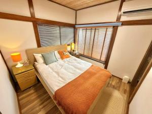 Postel nebo postele na pokoji v ubytování TOKYO HOSHI VILLIA-Private Villa in Tokyo ideal for groups and families
