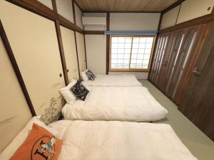 Postel nebo postele na pokoji v ubytování TOKYO HOSHI VILLIA-Private Villa in Tokyo ideal for groups and families