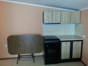A kitchen or kitchenette at Guest House "Dimova"