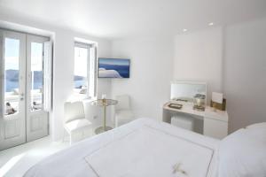 A bed or beds in a room at Canaves Sunday