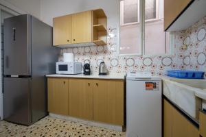 Η κουζίνα ή μικρή κουζίνα στο Nikaia One-Bedroom Comfort for 4 by ΜΡS