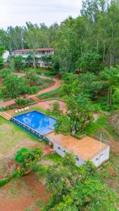 Πισίνα στο ή κοντά στο Shoonya Farm Retreat