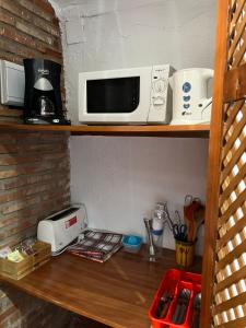 Η κουζίνα ή μικρή κουζίνα στο Cueva de María 1 +7 φωτογραφίες