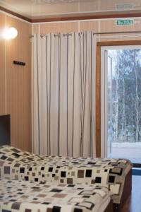 Кровать или кровати в номере Отель Drova