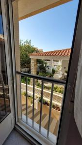an open door to a balcony with a view at 009 Bungalow La Mata in La Mata