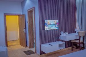 TV in/ali zabaviščno središče v nastanitvi Hannan Residence