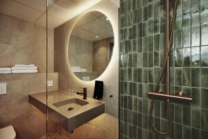 Koupelna v ubytování Stord Hotel