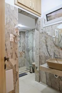 Ένα μπάνιο στο Best House Electra Pasalimani Piraeus