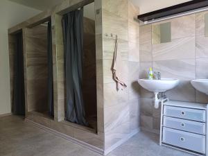 Koupelna v ubytování Apartmány Kortan