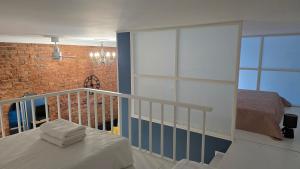 Postel nebo postele na pokoji v ubytování Kurkowa GamaHome Cozy Apartments