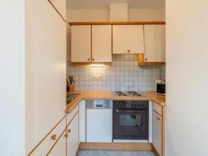 Kuchyňa alebo kuchynka v ubytovaní Beautiful apartment in Mittersill with balcony