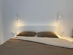 A bed or beds in a room at Eleni's Studios