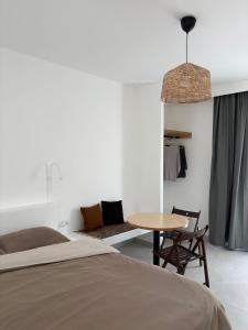 A bed or beds in a room at Eleni's Studios