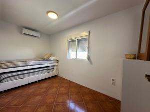 Postel nebo postele na pokoji v ubytování AYAMONTE Sunset