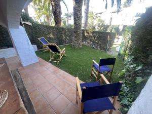 Vonkajšia záhrada v ubytovaní Casa con Jardín Privado, Chimenea y Piscina Comunitaria, cerca del Golfo y Playa de Pals - ES-226-31