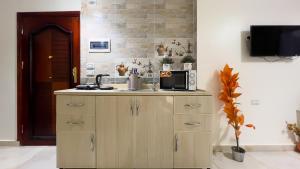 Dapur atau dapur kecil di Luxury pyramids jacuzzi view inn