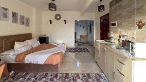 Katil atau katil-katil dalam bilik di Luxury pyramids jacuzzi view inn