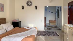 Katil atau katil-katil dalam bilik di Luxury pyramids jacuzzi view inn