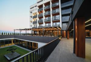 a view of a building from a balcony at Tsar Samuil Hotel in Strumica