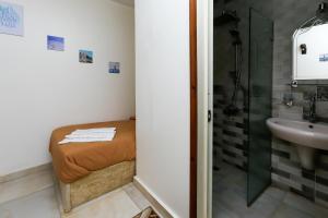Bilik mandi di Luxury pyramids jacuzzi view inn