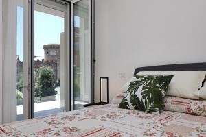 Katil atau katil-katil dalam bilik di Little Flat - Cozy Stay with Borgo view