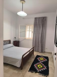 Postel nebo postele na pokoji v ubytování Apartment in Yasmine Hammamet