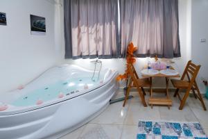 Katil atau katil-katil dalam bilik di Luxury pyramids jacuzzi view inn