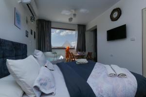 Katil atau katil-katil dalam bilik di Luxury pyramids jacuzzi view inn