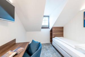 TV a/nebo společenská místnost v ubytování Hotel Mondschein