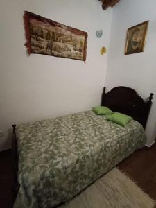Ένα ή περισσότερα κρεβάτια σε δωμάτιο στο O Cantinho dos Avós +18 φωτογραφίες