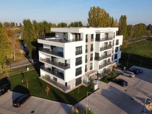 an overhead view of a white apartment building at Rivapark in Dunajská Streda