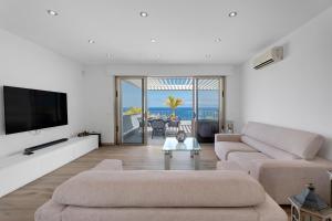 Et tv og/eller underholdning på Villa Arenas 3 Playa la Arena