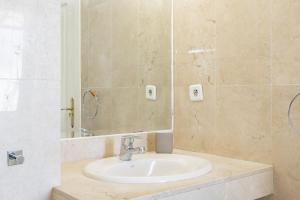 Kúpeľňa v ubytovaní Apartamento Giralda