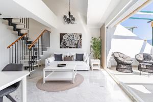 Posedenie v ubytovaní Apartamento Giralda