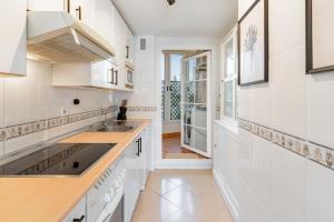 Kuchyňa alebo kuchynka v ubytovaní Apartamento Giralda