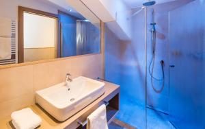 Koupelna v ubytování Hotel Hasslhof