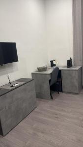 A television and/or entertainment centre at Holiday House Fifteen