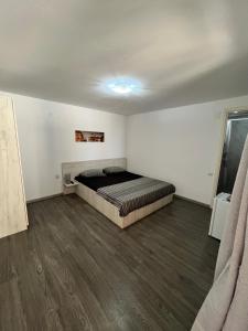 Postel nebo postele na pokoji v ubytování Vila Aron