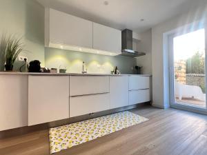 Una cocina o cocineta en Duplex 3 Chambres - Jardin - Terrasse - Parking au pied du duplex 34 fotos más