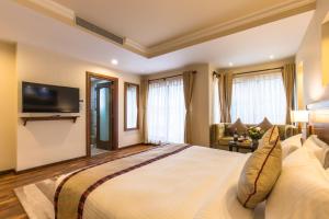 TV a/nebo společenská místnost v ubytování Hotel Kutumba