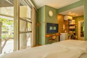 Postel nebo postele na pokoji v ubytování Still apartment + 18 fotografií