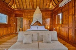 Ένα ή περισσότερα κρεβάτια σε δωμάτιο στο Padiku Villa Semana Private Pool +18 φωτογραφίες