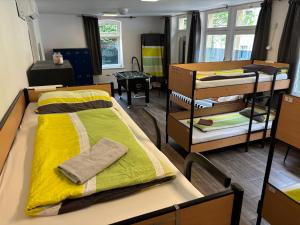 Postel nebo postele na pokoji v ubytování Alte Schule